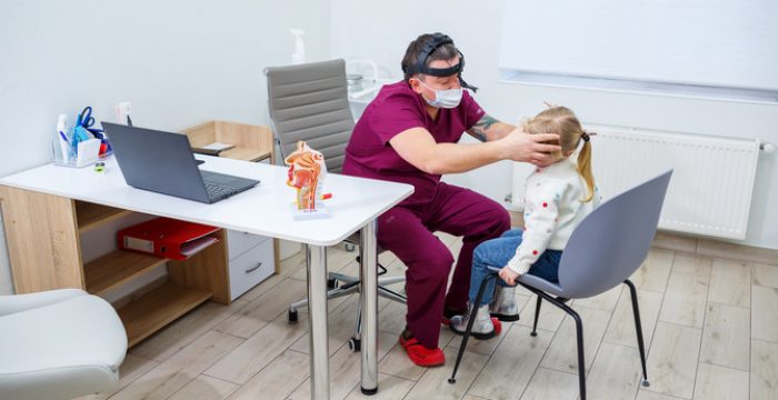 The child is examined by an ENT specialist. Diagnosis of respiratory tract disease in a child