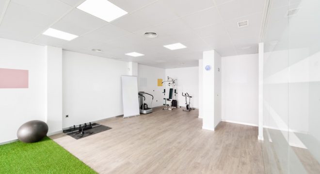 Interior of physiotherapy clinic with equipment for rehabilitation. Physical therapy center.